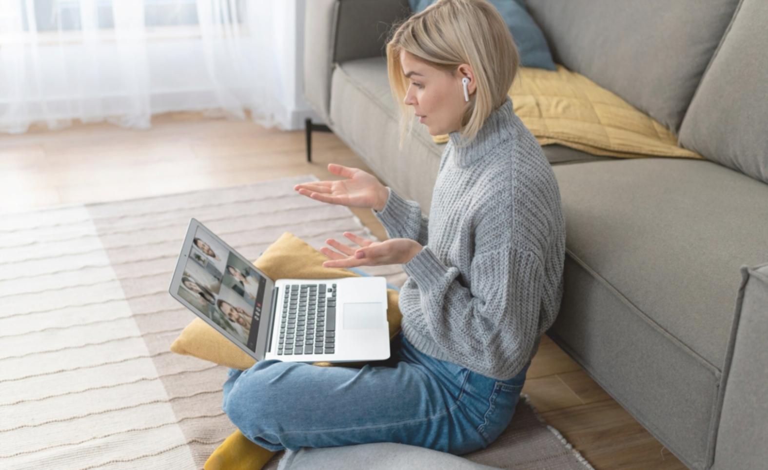 Students working together on financial analysis project in collaborative learning environment